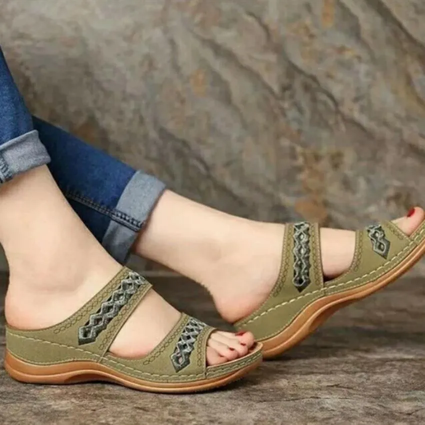 Women hollow out two strap 
wedge slide sandals